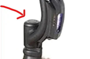 Close-up of a black hose nozzle with a red arrow pointing to it on a white background.