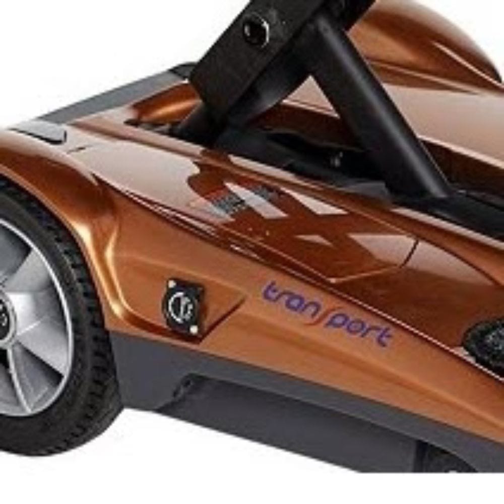 Close-up of a toy car with 'transport' branding on a white background