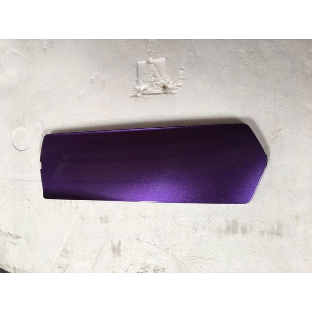 Purple object on a marble surface