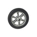 Black tire with silver rim on a white background