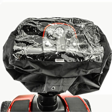 Black rain cover on a motorcycle headlight with visible brand logo.