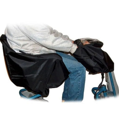 Person sitting on a folding chair with a black cover over them on a white background