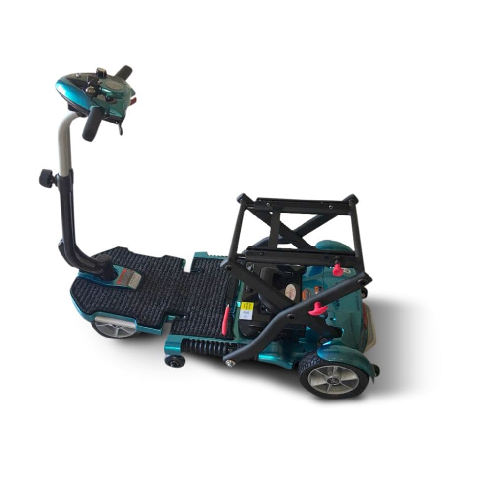 Teal and black mobility scooter on a white background
