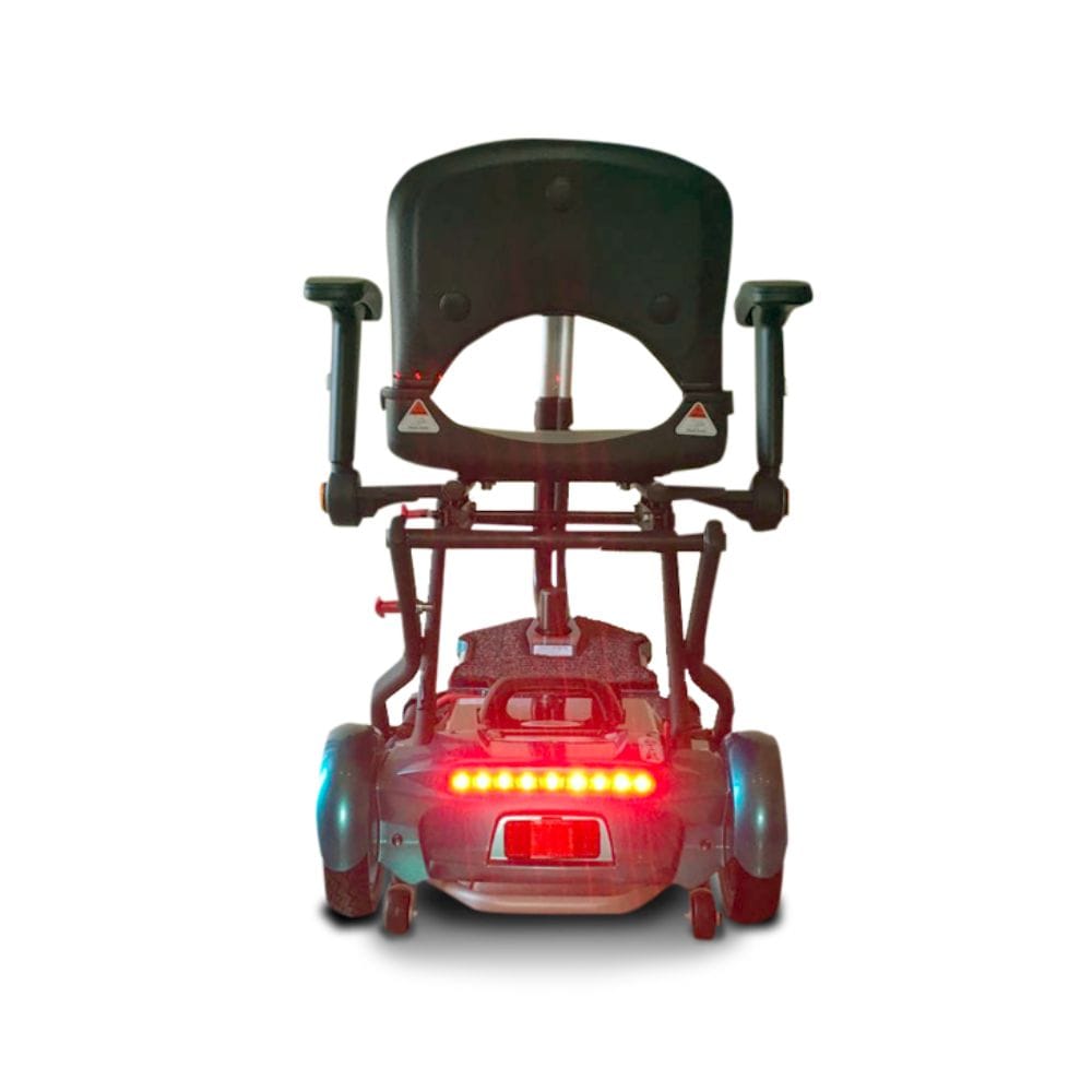 Red scooter with visible lights on a white background