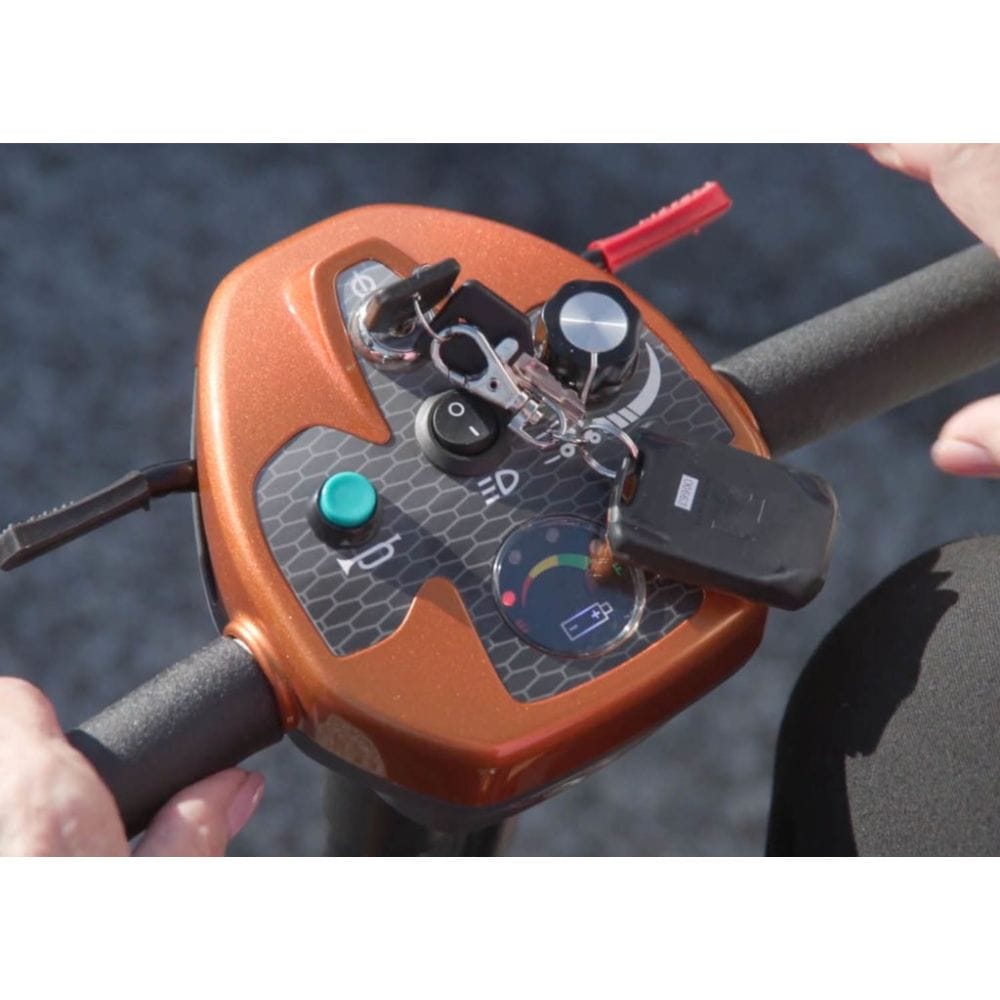 Close-up of a control panel with buttons and levers, likely for a machine or vehicle, against a blurred background.