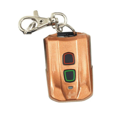 Copper-colored remote control keychain with a clasp on a white background