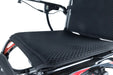 Close-up of the Monarch Mobility Ezi-Fold Carbon’s breathable black mesh seat cushion and backrest.