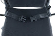 Close-up of the Monarch Mobility Ezi-Fold Carbon’s adjustable lap belt with buckle across the black mesh seat.