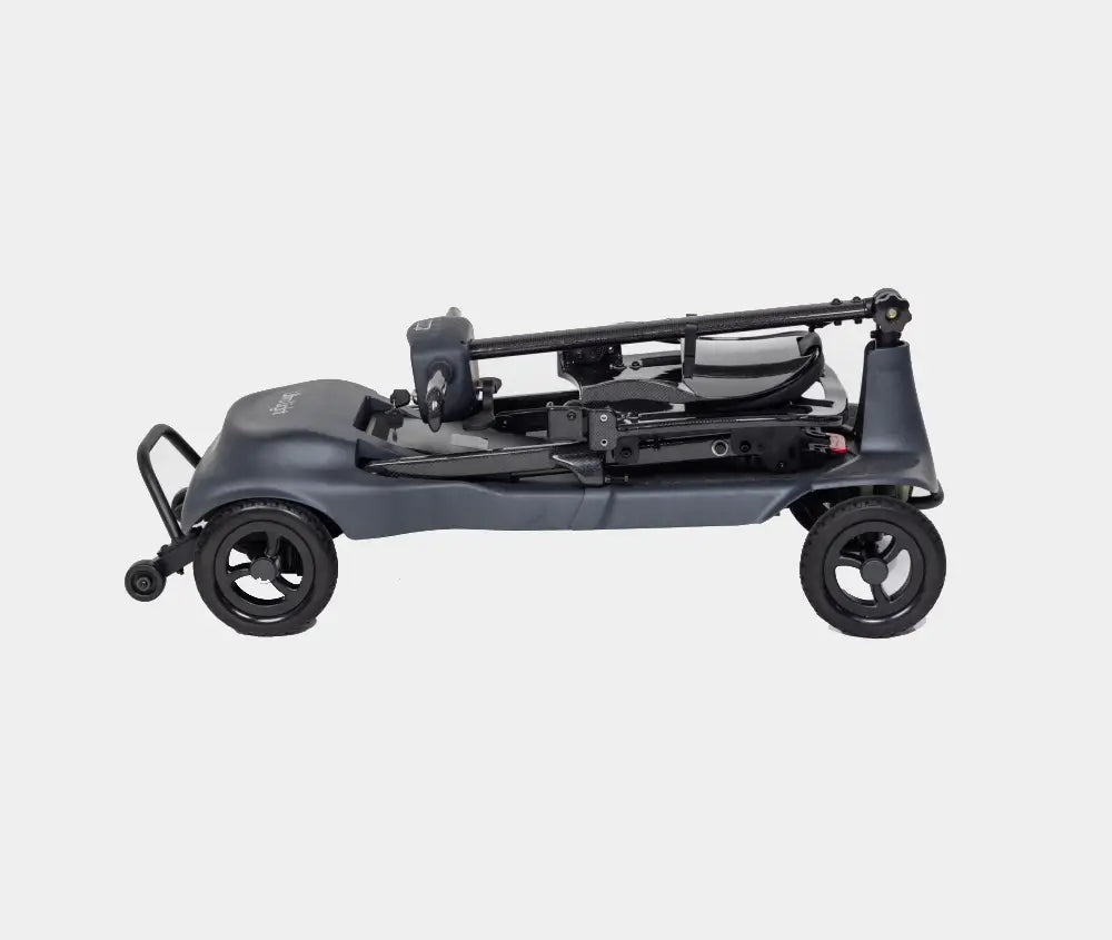 Monarch Mobility Genie Ultralight folding mobility scooter fully folded for compact transport and storage