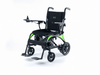 Monarch Mobility Ezi-Fold Carbon power wheelchair with black seating, bright green frame accents, joystick control, and swing-away footrests.