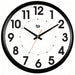 Wall clock with black frame and white face displaying the time.