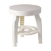 White stool with a circular design on a white background