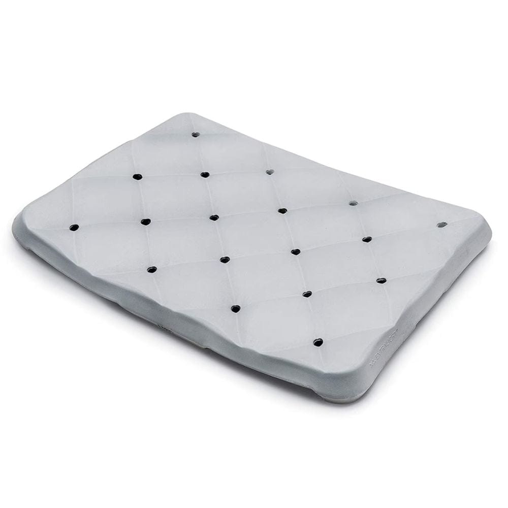 Gray cushion with multiple holes on a white background