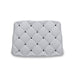 Gray quilted mat with black diamond pattern on a white background