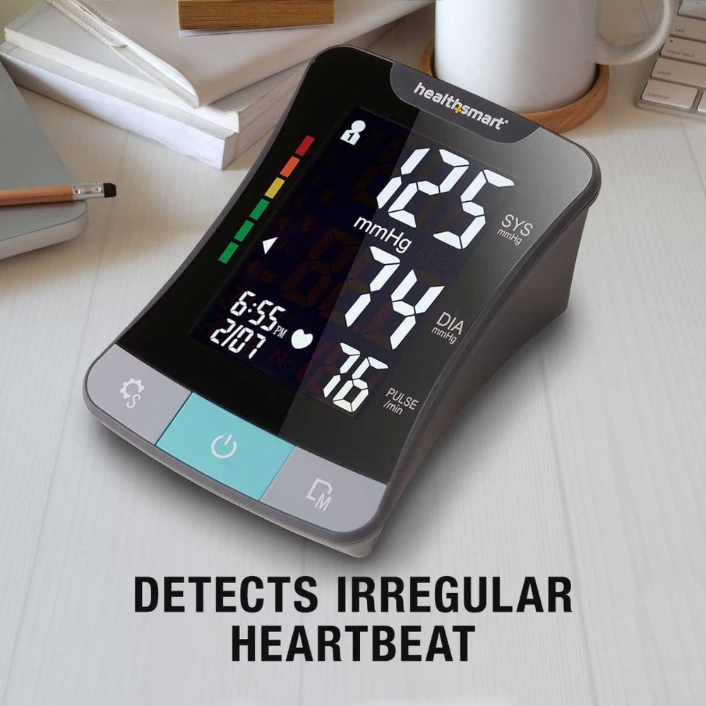 Healthsmart blood pressure monitor on a desk with text 'Detects Irregular Heartbeat'.
