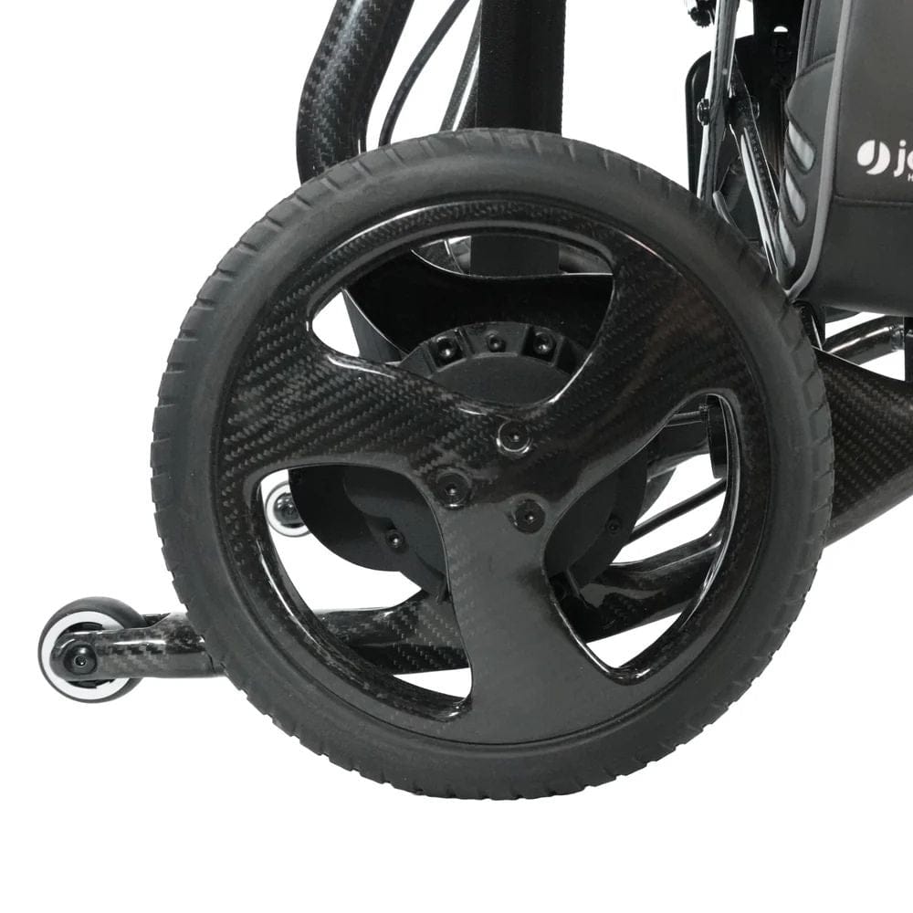 Close-up of a wheelchair wheel with a white background