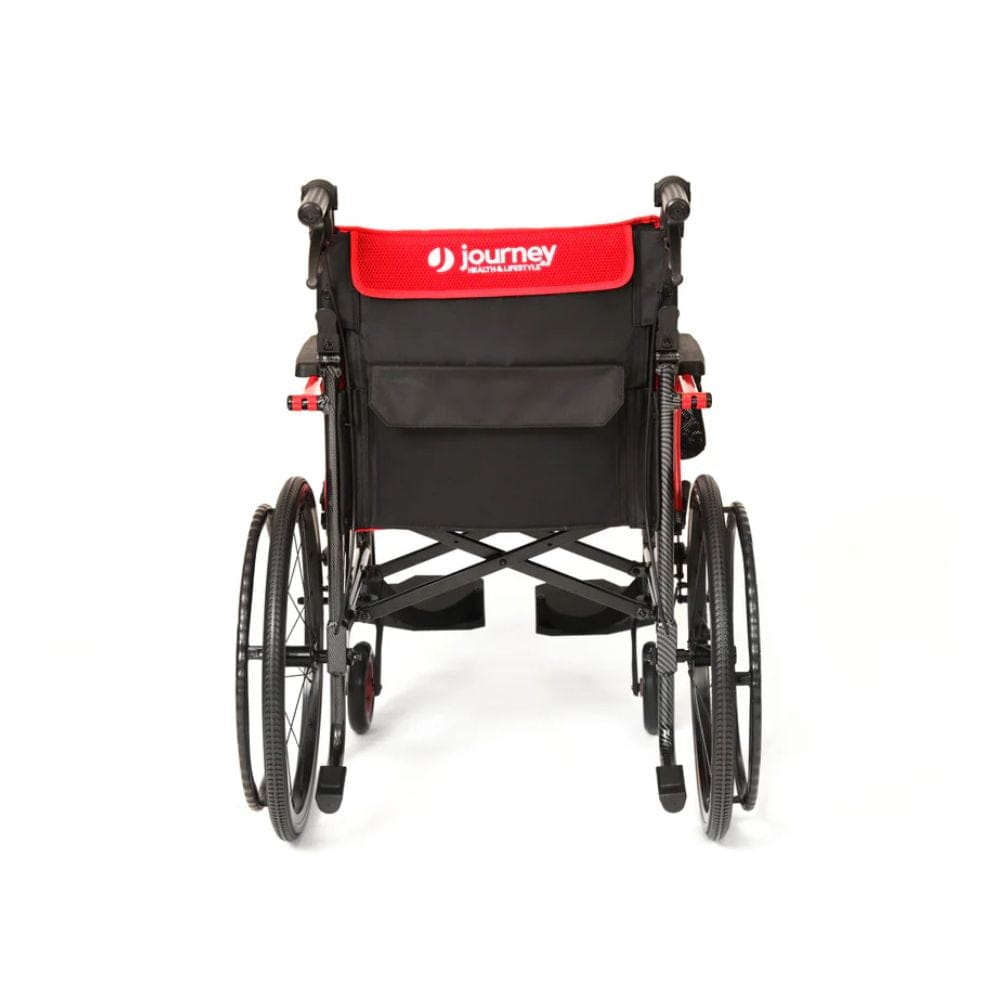 Black wheelchair with red seat cover on a white background