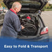 Man loading a folded wheelchair into the trunk of a car with text 'Easy to Fold & Transport'.