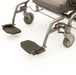 Wheelchair with footrests on a white background