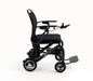 A black electric motorized wheelchair shown from a side profile view against a plain white background.