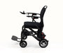 A black electric motorized wheelchair shown from a side profile view against a clean white background.