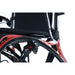 Close-up of a wheelchair with black and red design on a white background