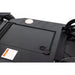 Close-up of a black electronic device with labels on a white background
