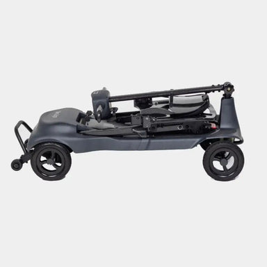 Black metal object with wheels on a white background