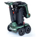 Green and black mobility scooter on a white background