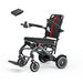 Black and red wheelchair with a visible brand logo on a white background