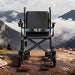 Black wheelchair with 16.5-inch seat width measurement against a mountainous landscape.