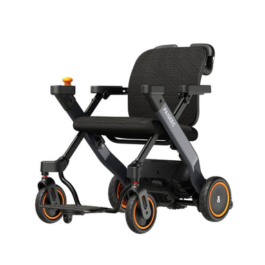 Black and orange mobility scooter on a white background