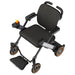 Black electric wheelchair with orange accents on a white background