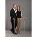 Man and woman standing side by side holding canes against a gray background