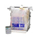 White plastic bag with 'THANK YOU' text, a can of paint, and a metal rack on a white background