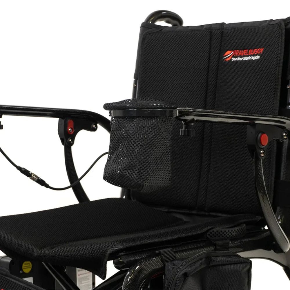 Black wheelchair with storage bags on a white background