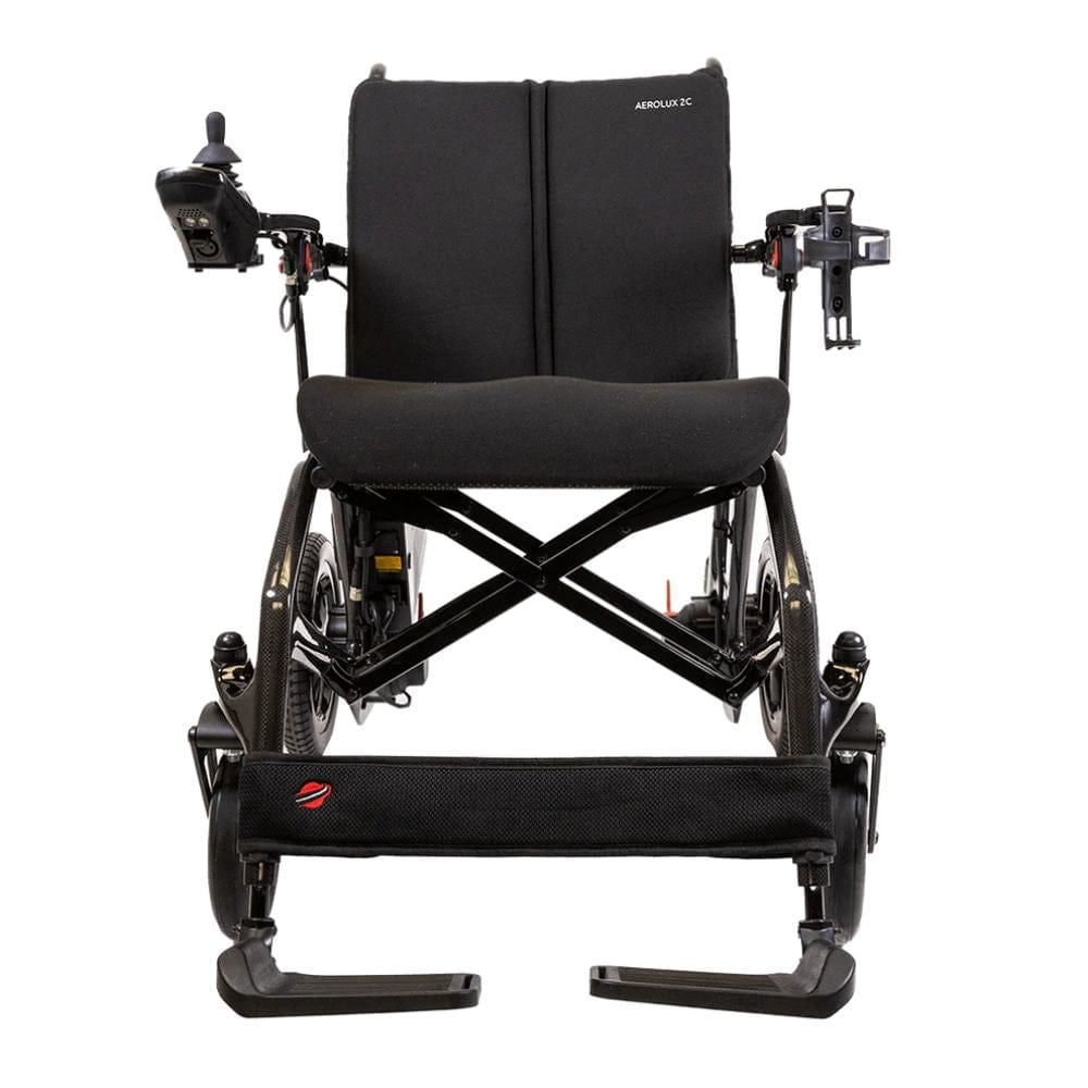 Black wheelchair with armrests and footrests on a white background