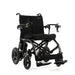 Black electric wheelchair on a white background