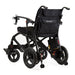 Black electric wheelchair with folded design on a white background