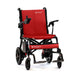 Red and black travel buggy chair on a white background