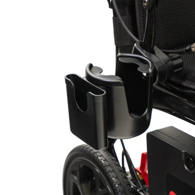 Black cup holder attached to a stroller on a white background