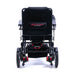 Black travel wheelchair with visible 'Travel Buggy' logo on a white background