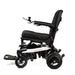 Black and white power wheelchair on a white background