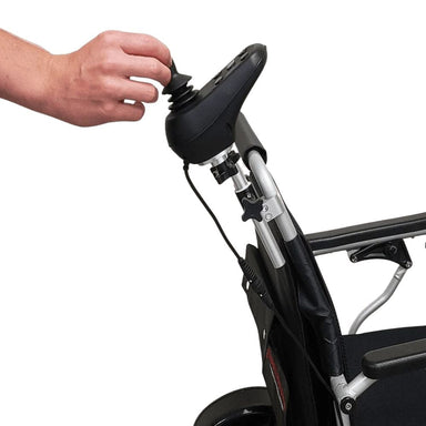 Hand adjusting a black bike seat on a bicycle with a white background