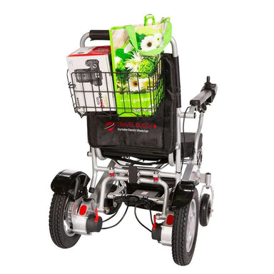 Portable electric wheelchair with a basket of flowers on a white background