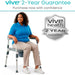 Woman sitting on a Vive health chair with a 2-year guarantee badge.