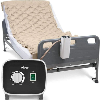 Electric adjustable bed with control panel labeled 'Vive' on a white background