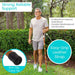 Man using a walking cane with text highlighting features like support, wood construction, leather strap, and non-slip tip.