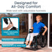 Woman using a wheelchair with features highlighted, including adjustable leg rests and a wide seat.