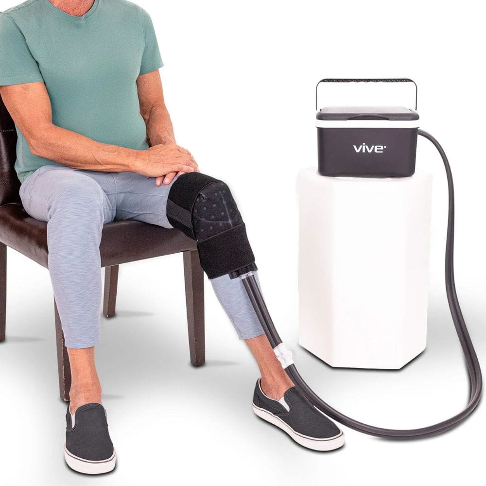 Person using a Vive leg blood circulation device on a white background